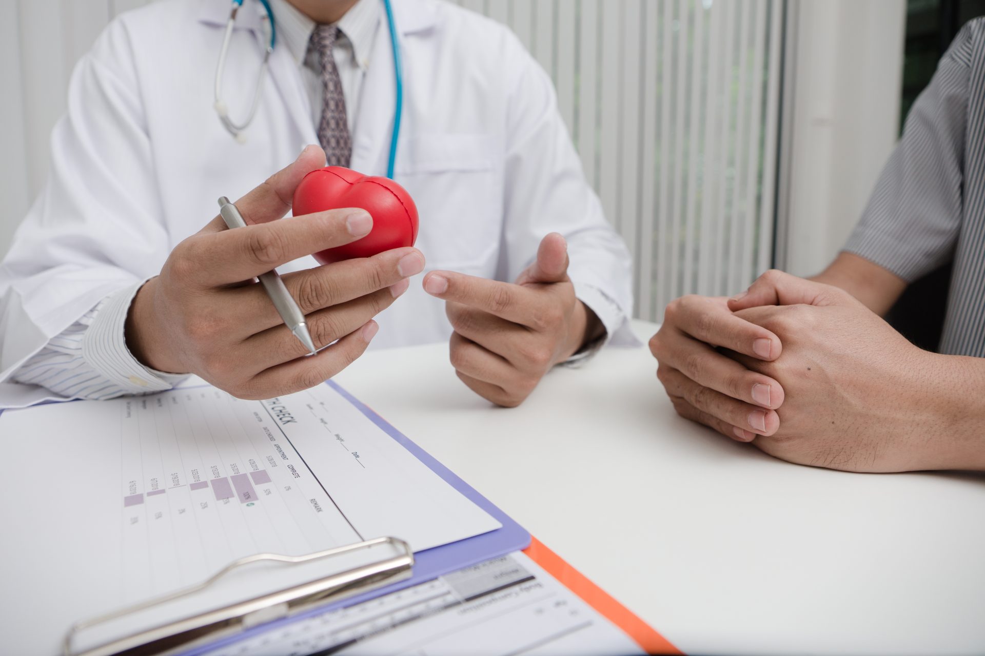 Doctor holding heart model