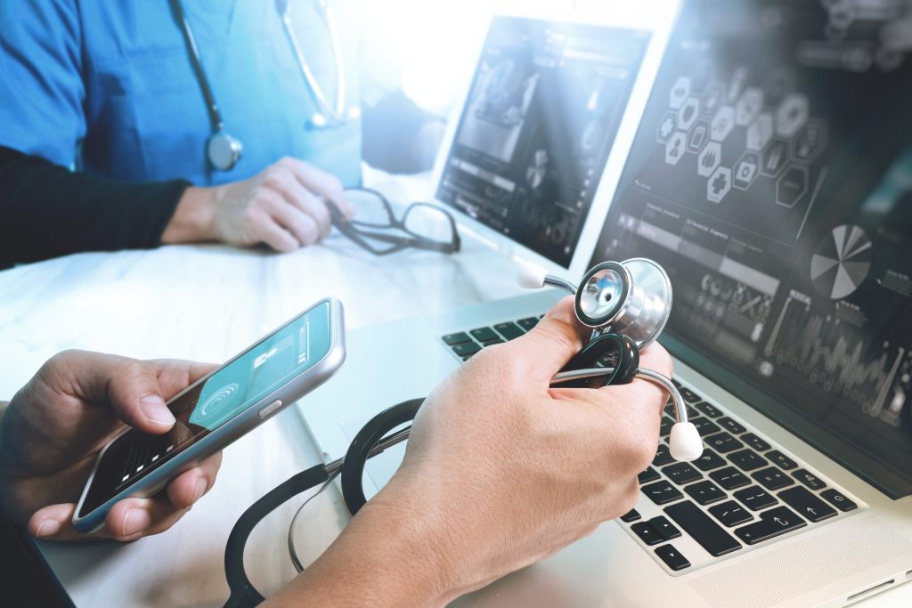 Medical professional using smartphone